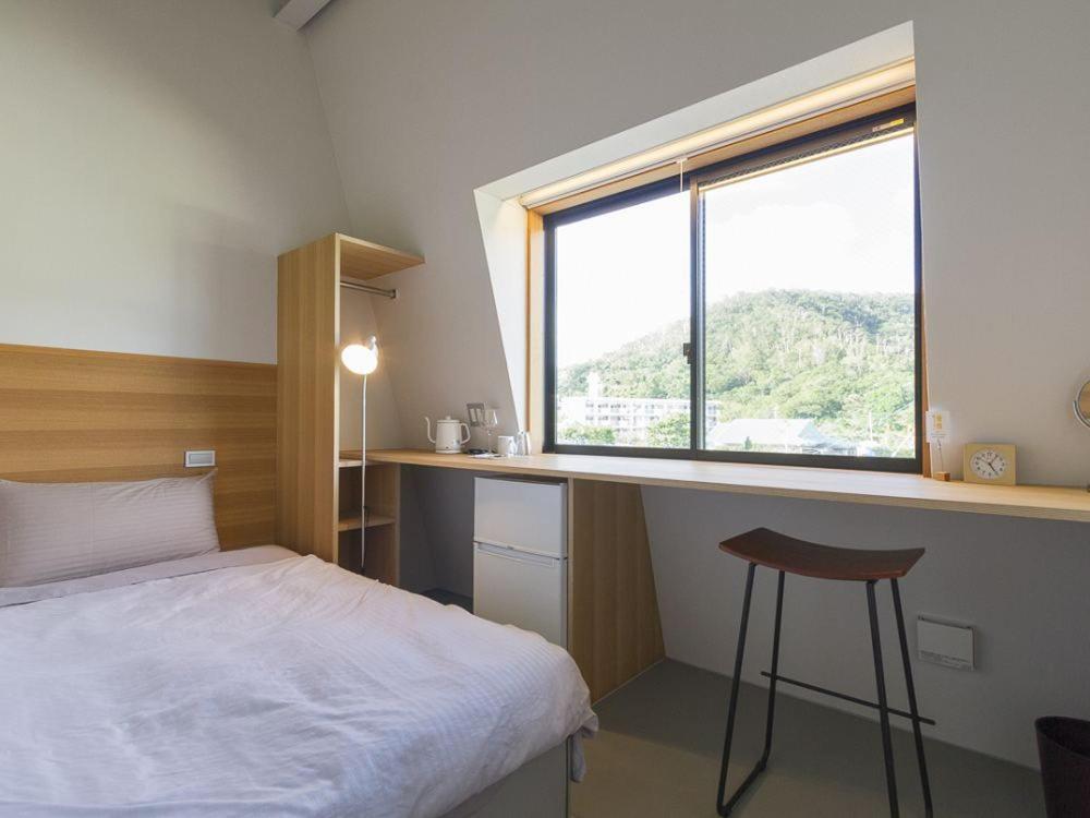 Denpaku Akakina Hotel Amami Esterno foto